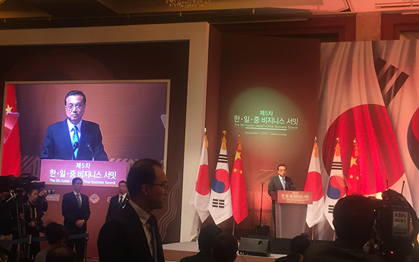 中国国务院总理李克强在三国工商峰会上发表讲话